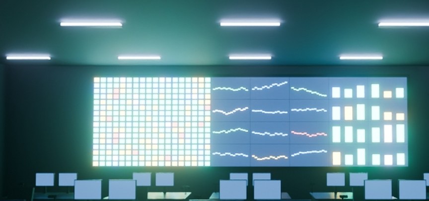 Cropped detail: monitoring dashboards on the NOC video wall.