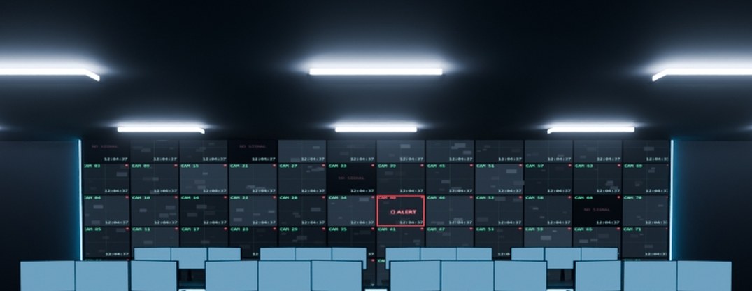 Cropped detail: the CCTV camera wall - labelled feeds and a flagged alert tile.